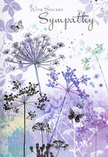 This sympathy card unfolds like a gentle visual poem, its design echoing the soft, skyward lines of wildflowers that might grow in a secluded patch near Leamouth Basin. Airy silhouettes of tall, fine-stemmed blooms stretch upwards, their delicate umbel heads rendered in layered tones of lavender, dusky indigo, and silvery blue. Each stem is so slender it seems almost weightless, bending slightly as if responding to the faintest breeze. Around them, the background is a calm wash of cool hues-muted purples, blue-grey, and soft white-blended in a way that suggests distant meadows fading into evening light. Faint impressions of additional foliage and petals drift across the scene like memories, adding depth without crowding the composition. Scattered among the flowers, small butterflies hover with wings so subtle they appear half-transparent, a quiet nod to transformation and enduring presence. The phrase "With Sincere Sympathy" appears in elegant script above or beside the floral silhouettes, its flowing letters harmonising with the gentle vertical lines of the stems. As a florist serving families across Leamouth, I recognise in this card the same understated elegance people so often seek when words feel too heavy: calm colours, natural forms, and a design that comforts rather than overwhelms. Paired with a simple funeral wreath or a hand-tied sympathy bouquet delivered locally, this image offers a tender, respectful embrace-nature's way of saying, "You are not alone," in a time of loss.